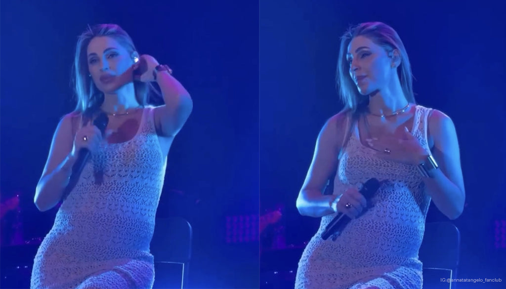 Anna Tatangelo in gravidanza indossa abito premaman bianco Pietro Brunelli durante concerto a Milano