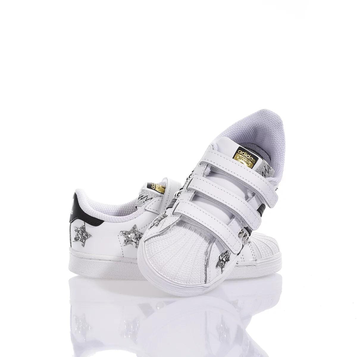Scarpe sportive bianche per bambini con stelle glitterate e chiusura a strappo