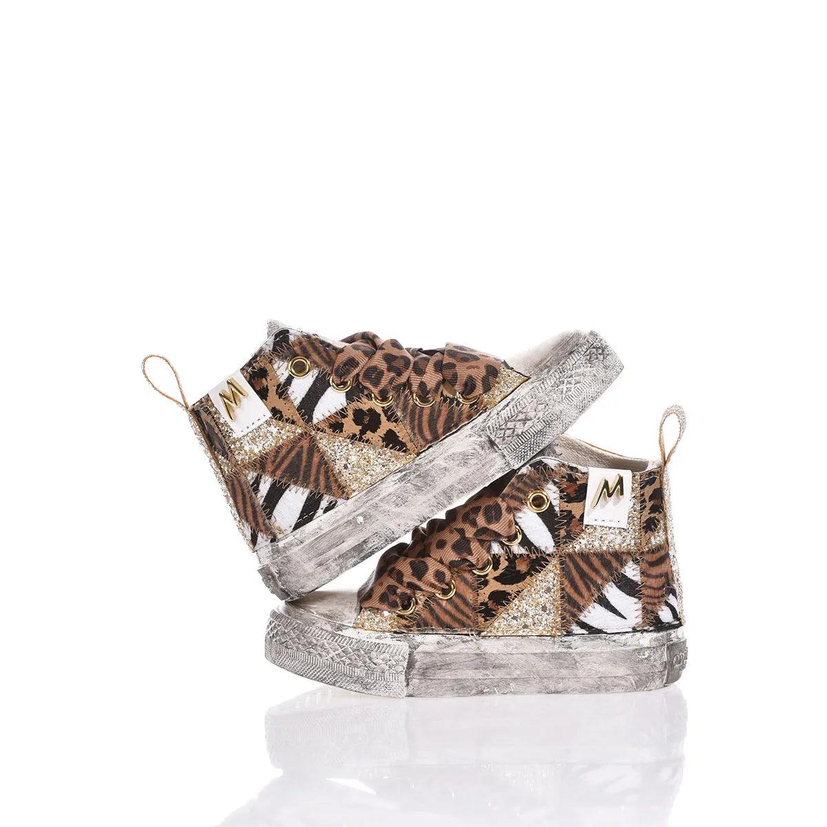 Sneakers donna effetto vintage con stampe animalier, ideali per look premaman trendy.