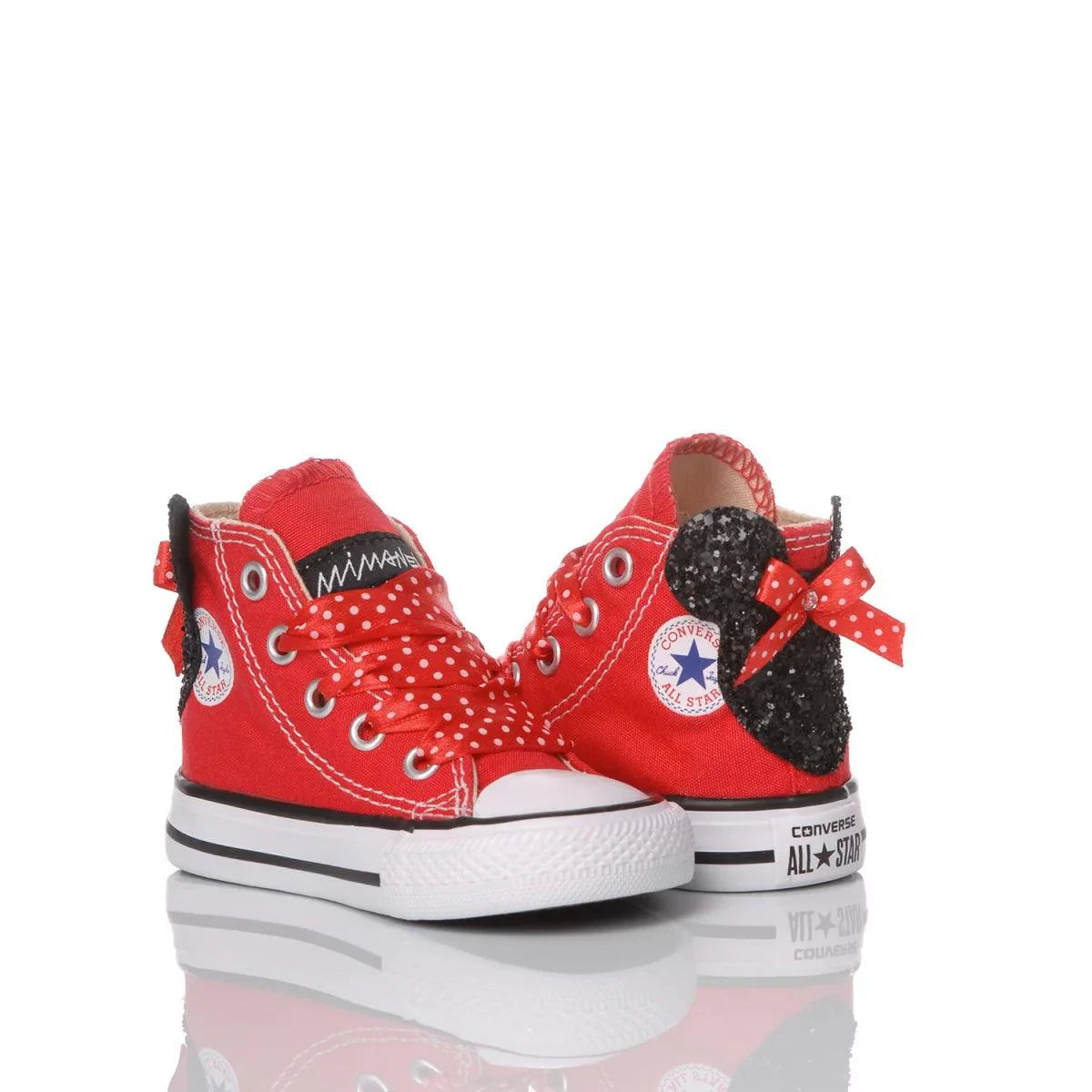 Sneakers rosse per bambina con pois, fiocco e dettagli glitter, ideali per look premaman fashion