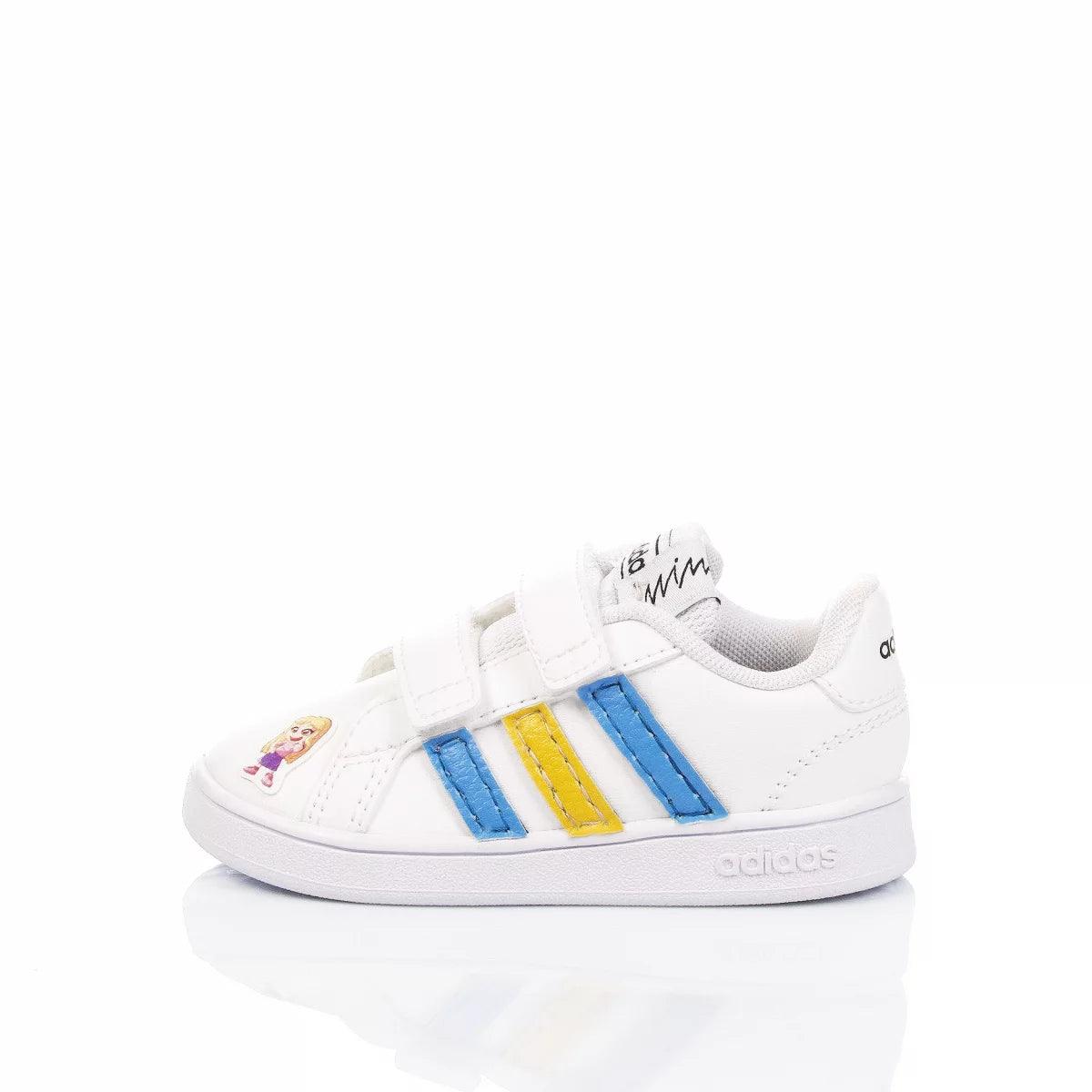 Scarpa da bambino bianca con strisce blu e gialle, chiusura a strappo e disegno cartoon