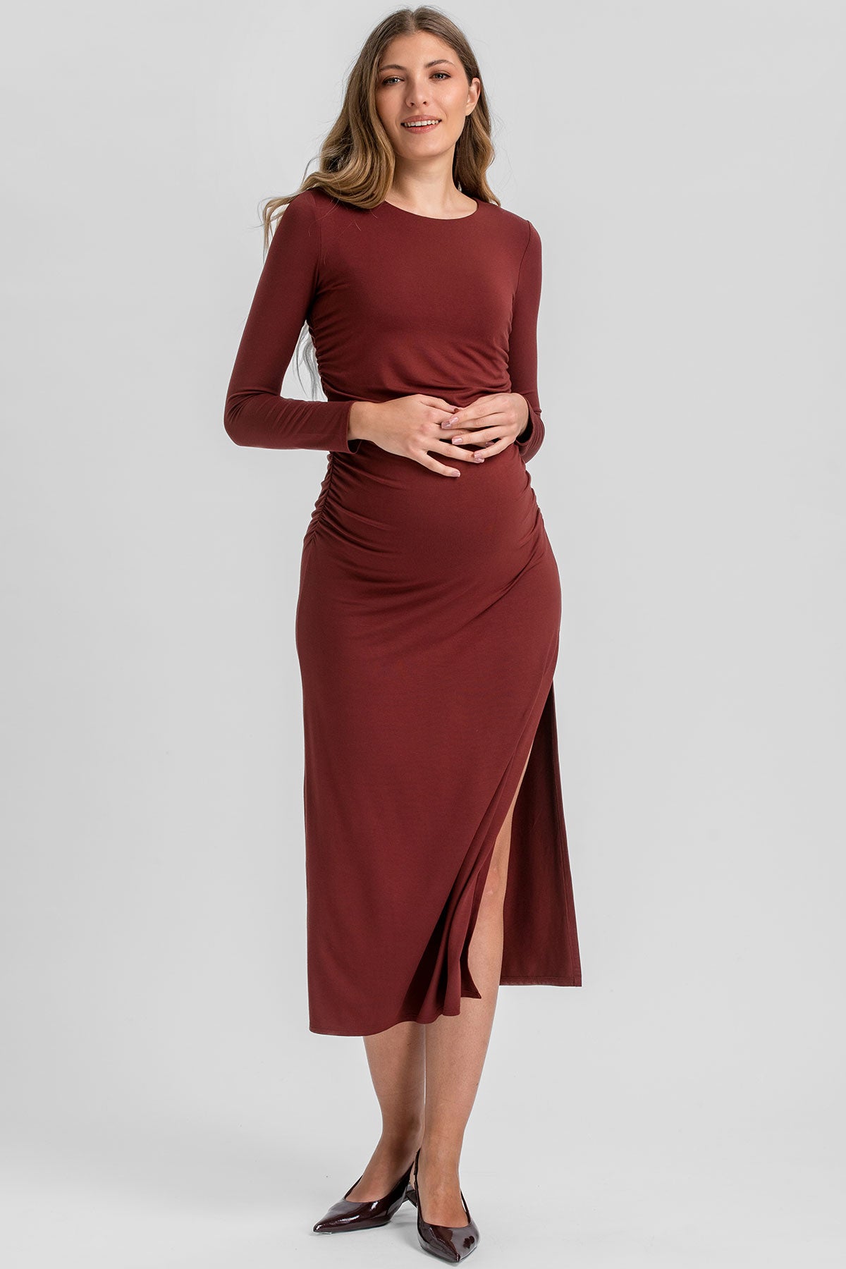 Ruby Wine maternity dress with long sleeves.