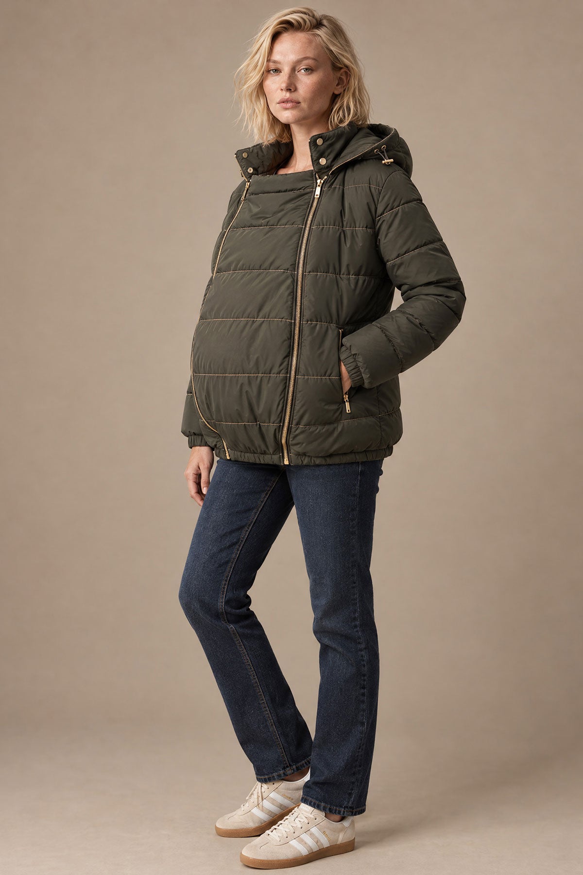 Khaki maternity and babywearing jacket with removable panel.