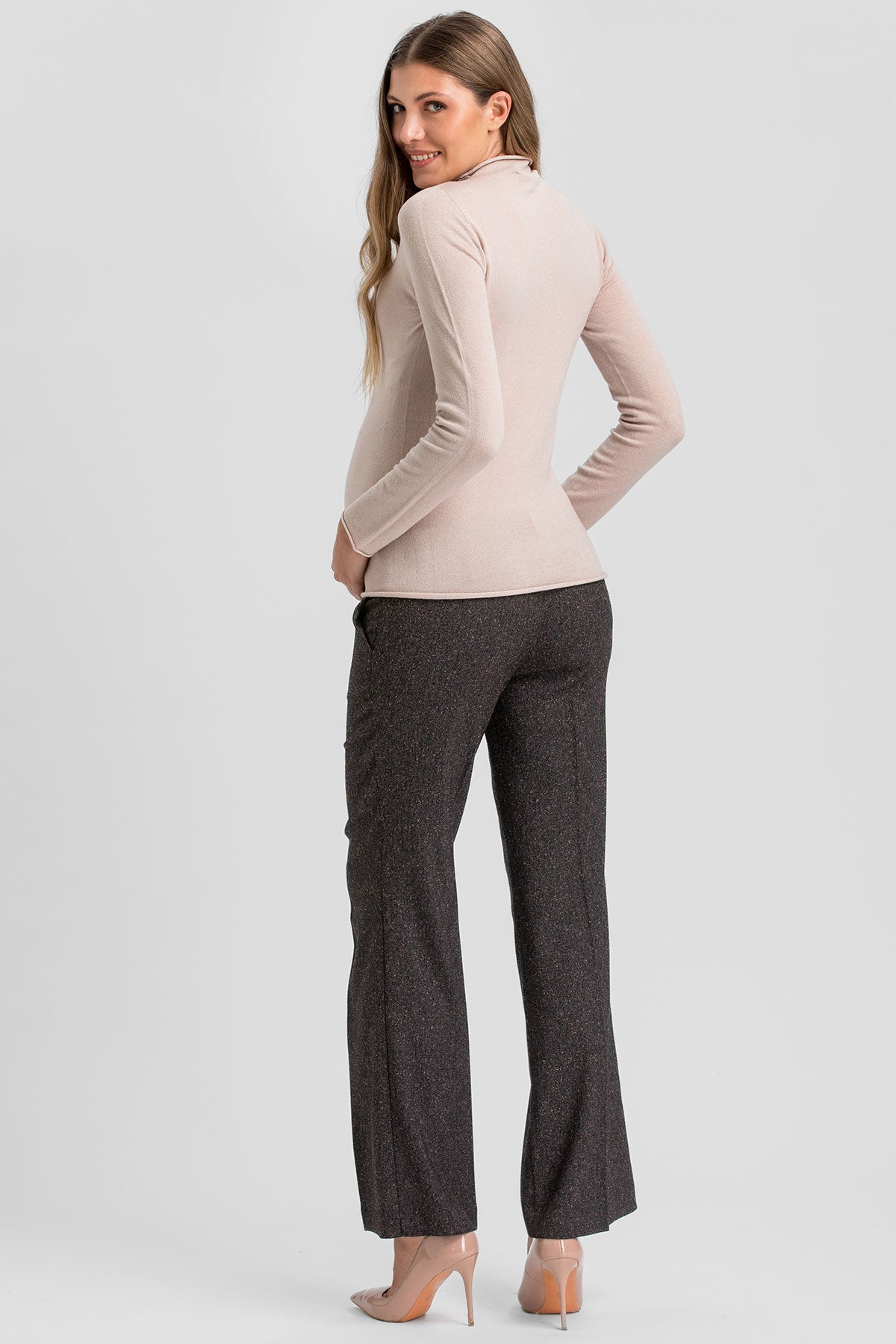 Beige maternity knit top with mock neck.