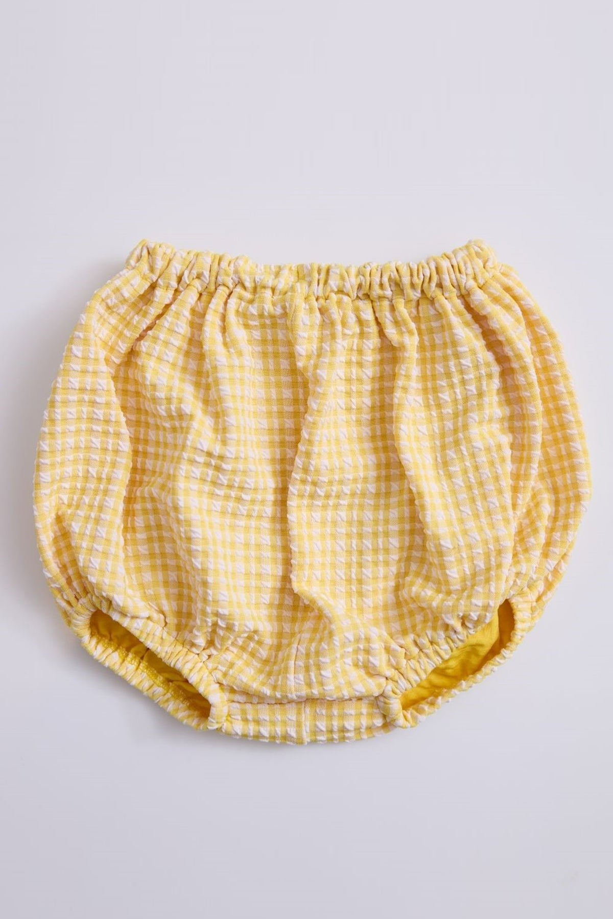 Culotte neonata gialla a quadretti, tessuto leggero con elastici morbidi, stile estivo