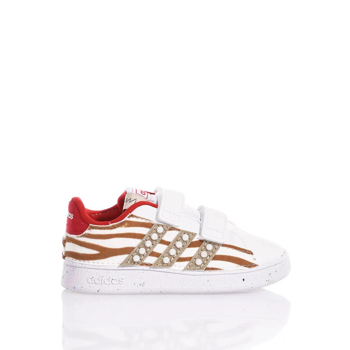 Sneaker bianca con dettagli animalier, chiusura a strappo, scarpa comoda premaman.