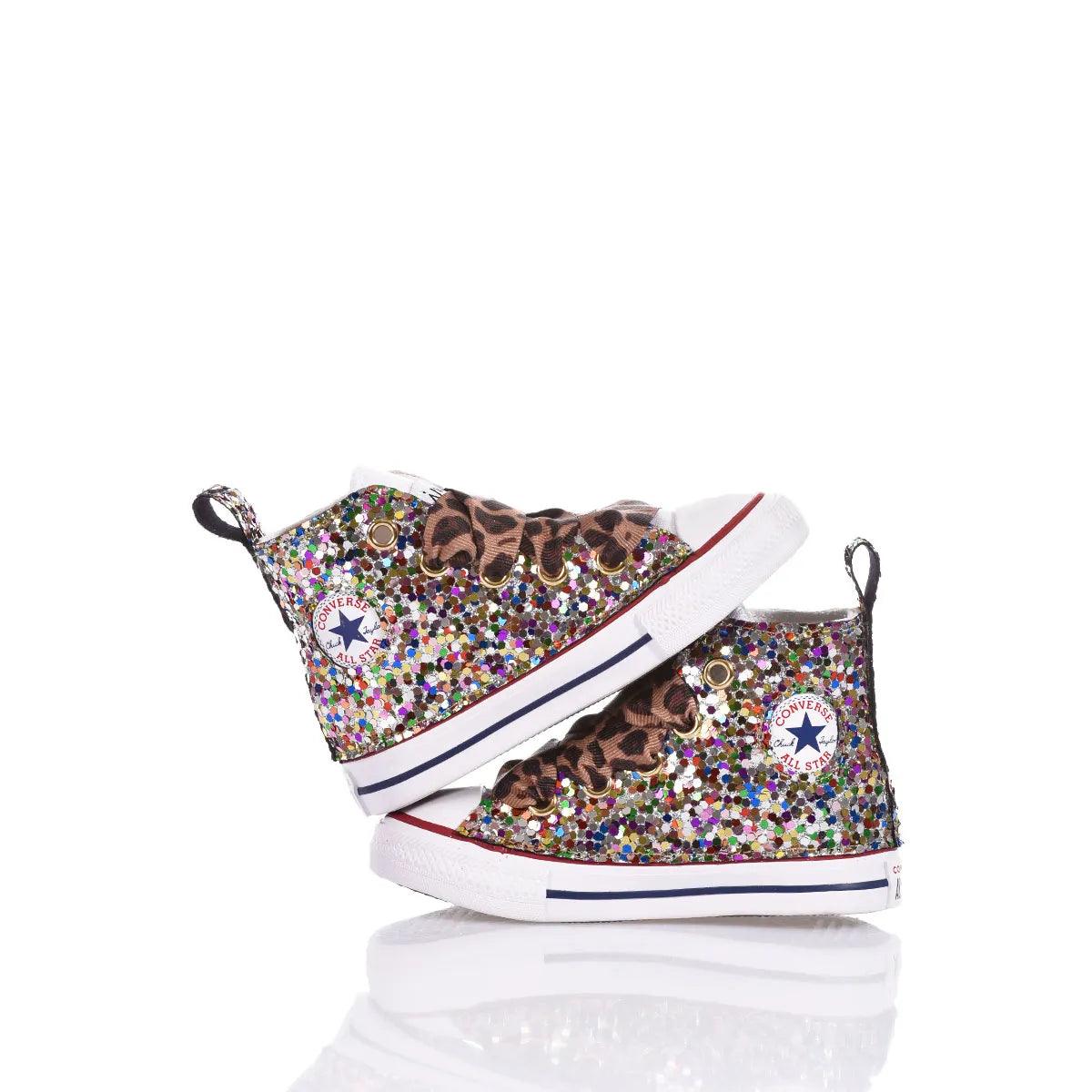Scarpe glitterate bambino con fantasia animalier, ideali per look premaman trendy