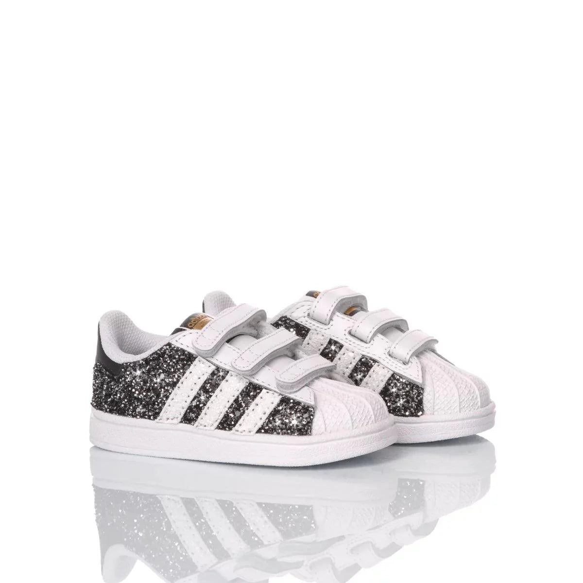 Sneakers bianche e nere con glitter, scarpe bambino, moda abbigliamento premaman