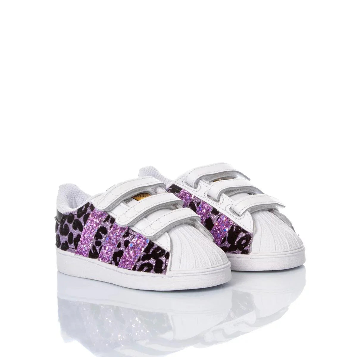 Scarpe da bambina bianche con dettagli glitter viola e motivo animalier, chiusura a strappo