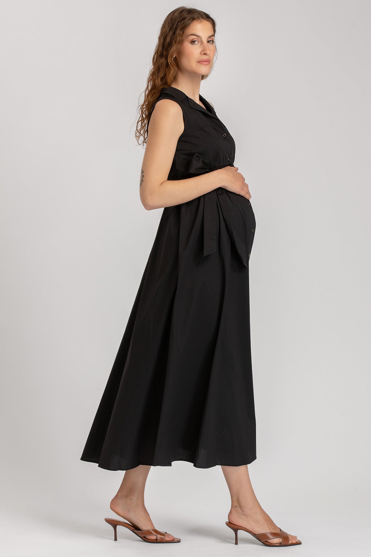 Abito premaman nero senza maniche, elegante e confortevole, ideale per la gravidanza