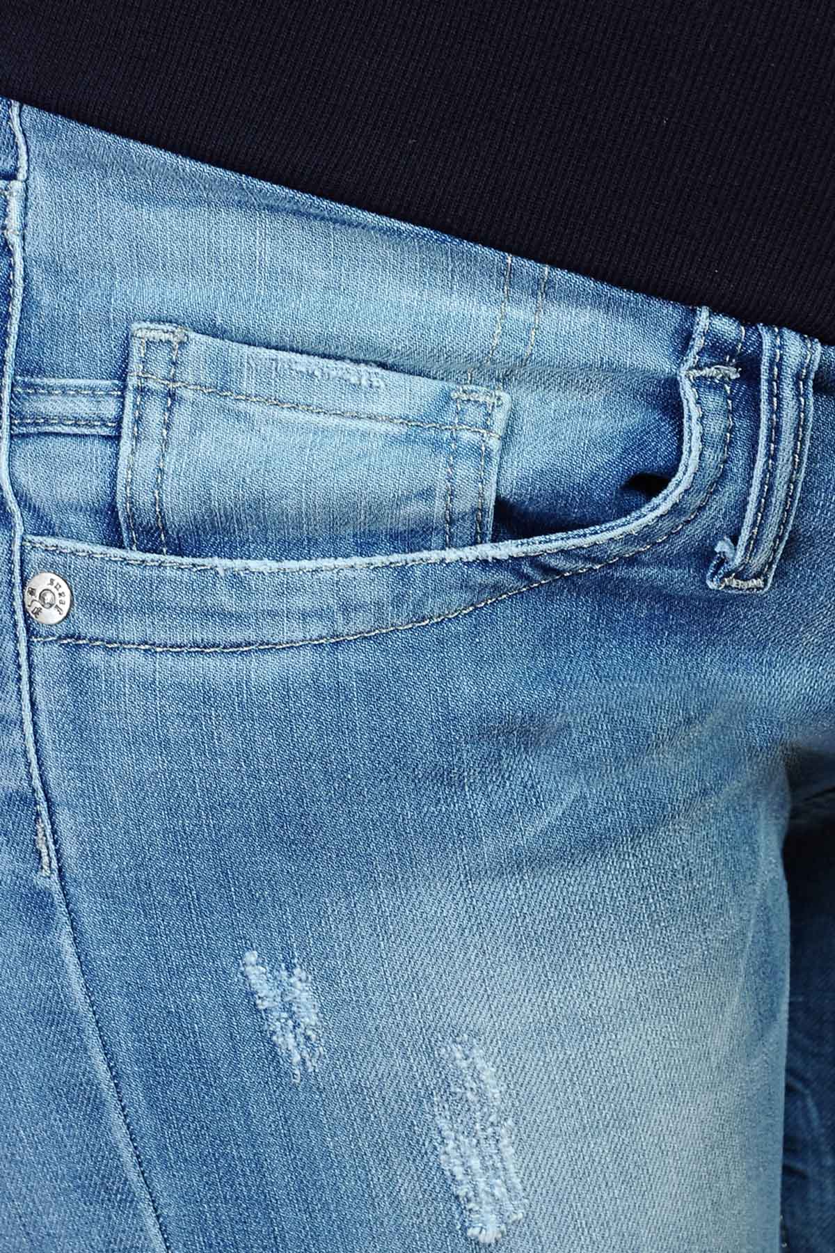  La confortevole fascia elastica garantisce una vestibilità perfetta durante tutte le fasi della gravidanza.