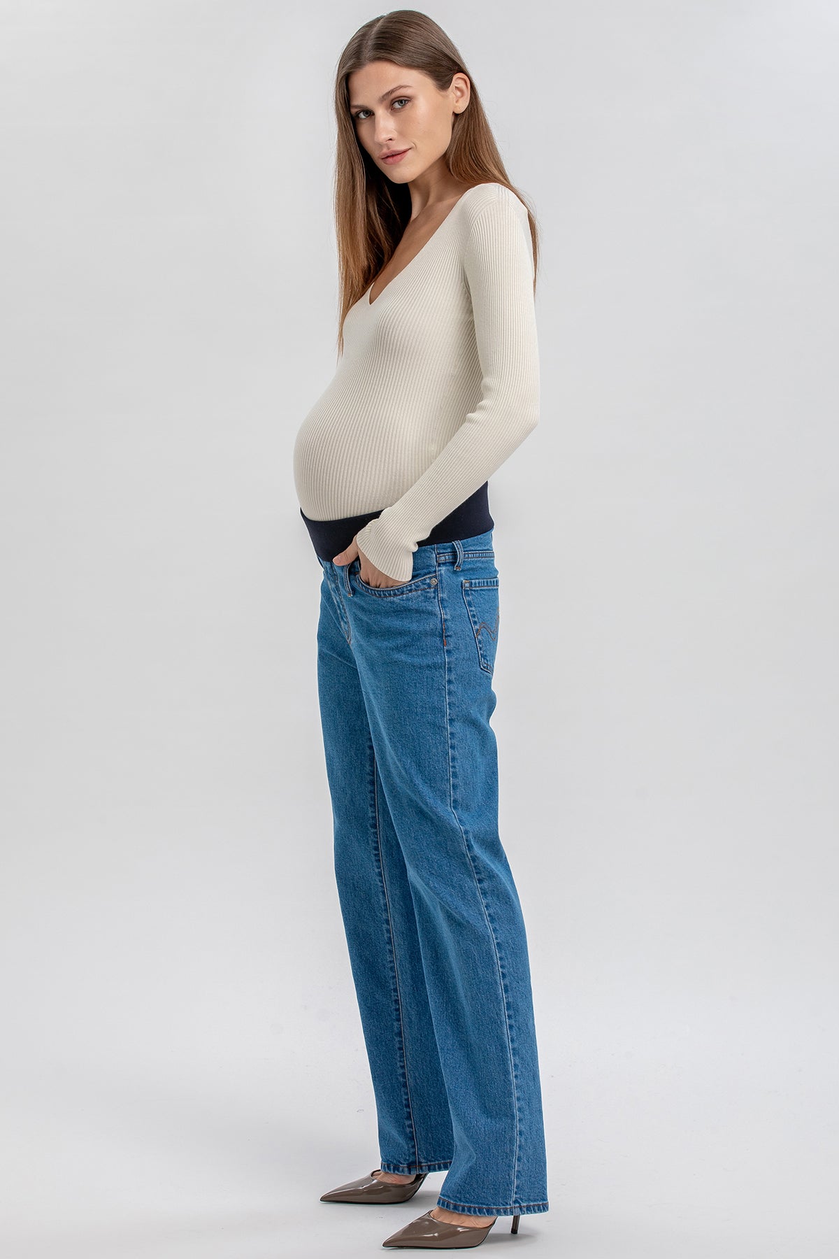 Straight-leg maternity jeans in blue denim with a comfortable black stretchy belly band.